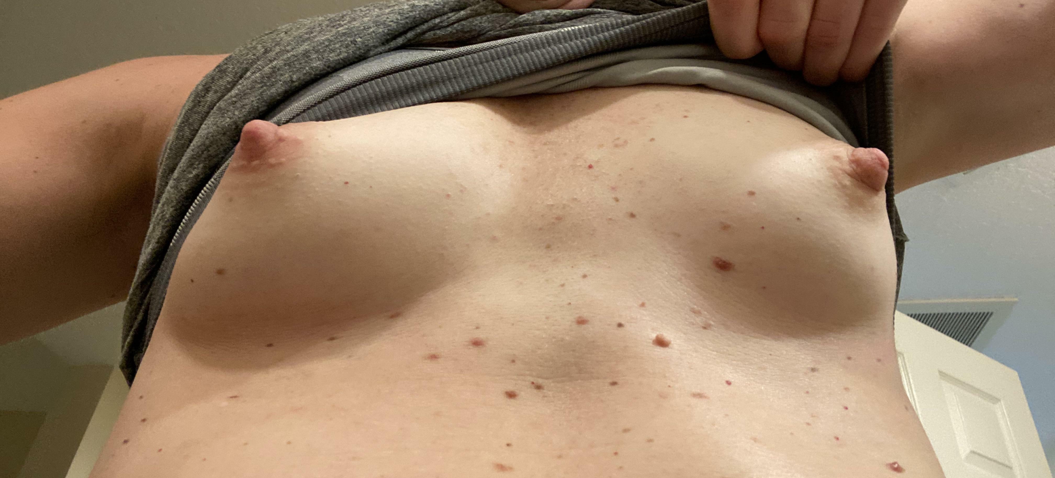 Tiny tits set free after a workout. Nipples are happy to be out..