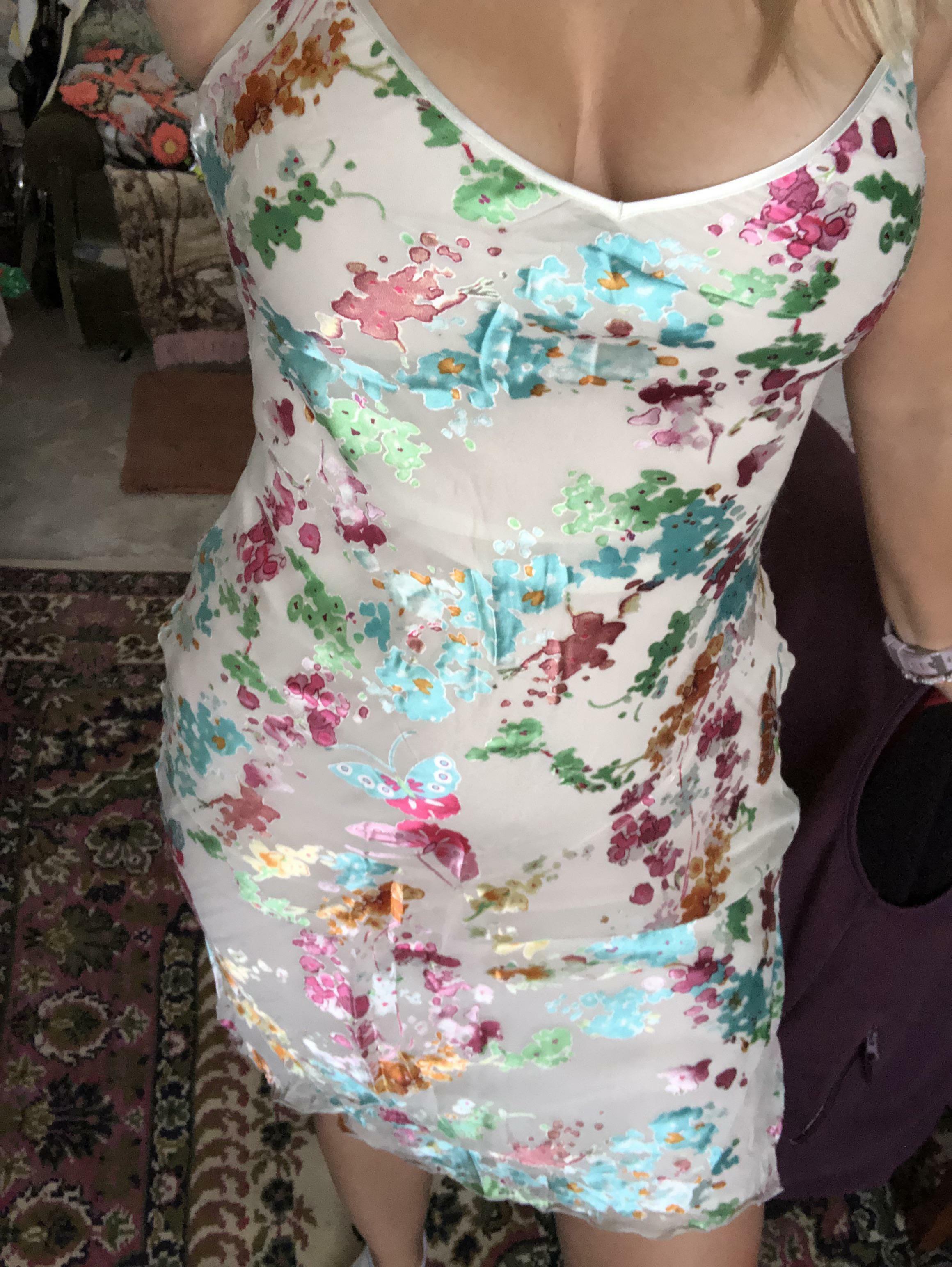 A bra wouldn’t work with this dress , do I look okay?