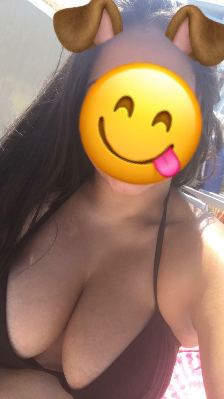 Tanning at the beach... do you like my top?