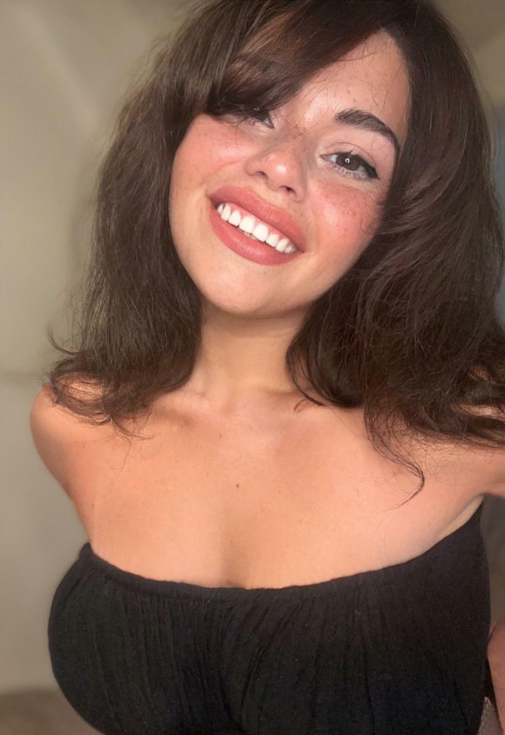 Freckled Latina smile