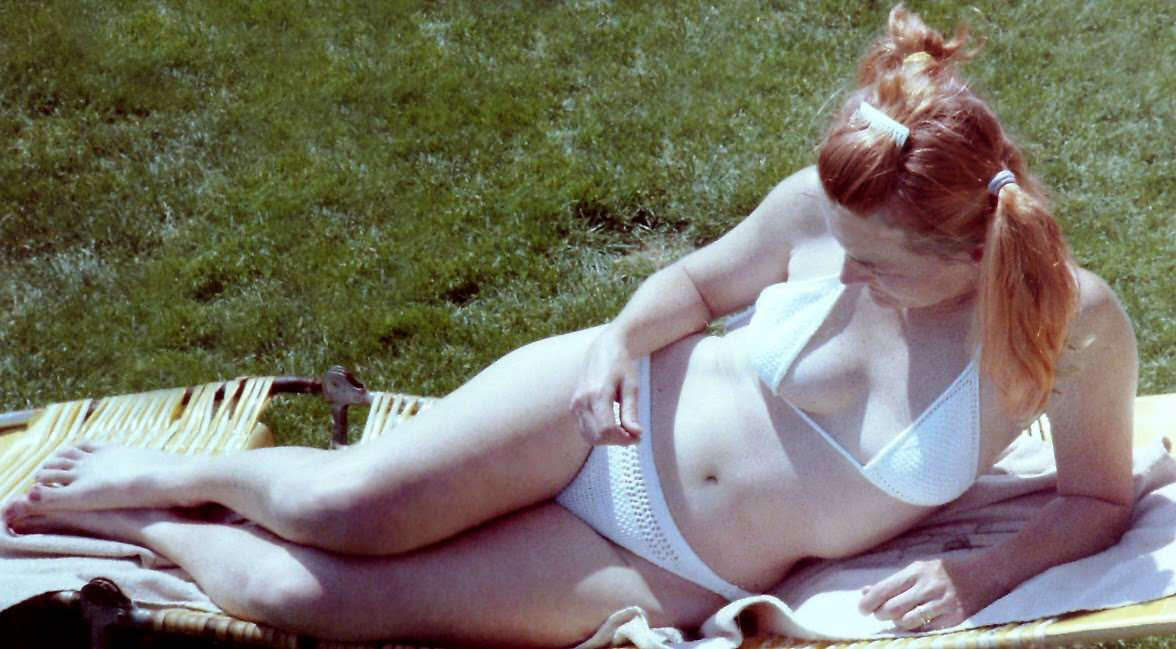 Vintage 1980s redhead sunning.....