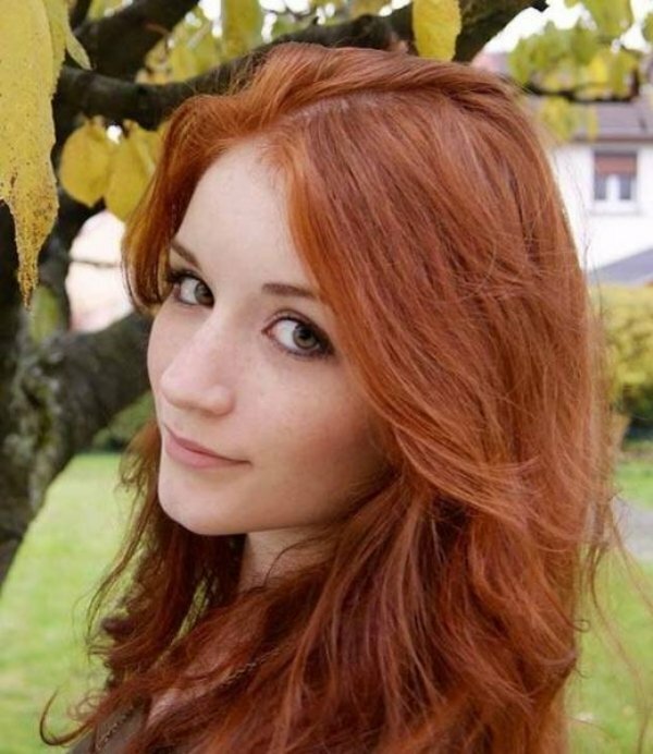 Red hair and green eyes