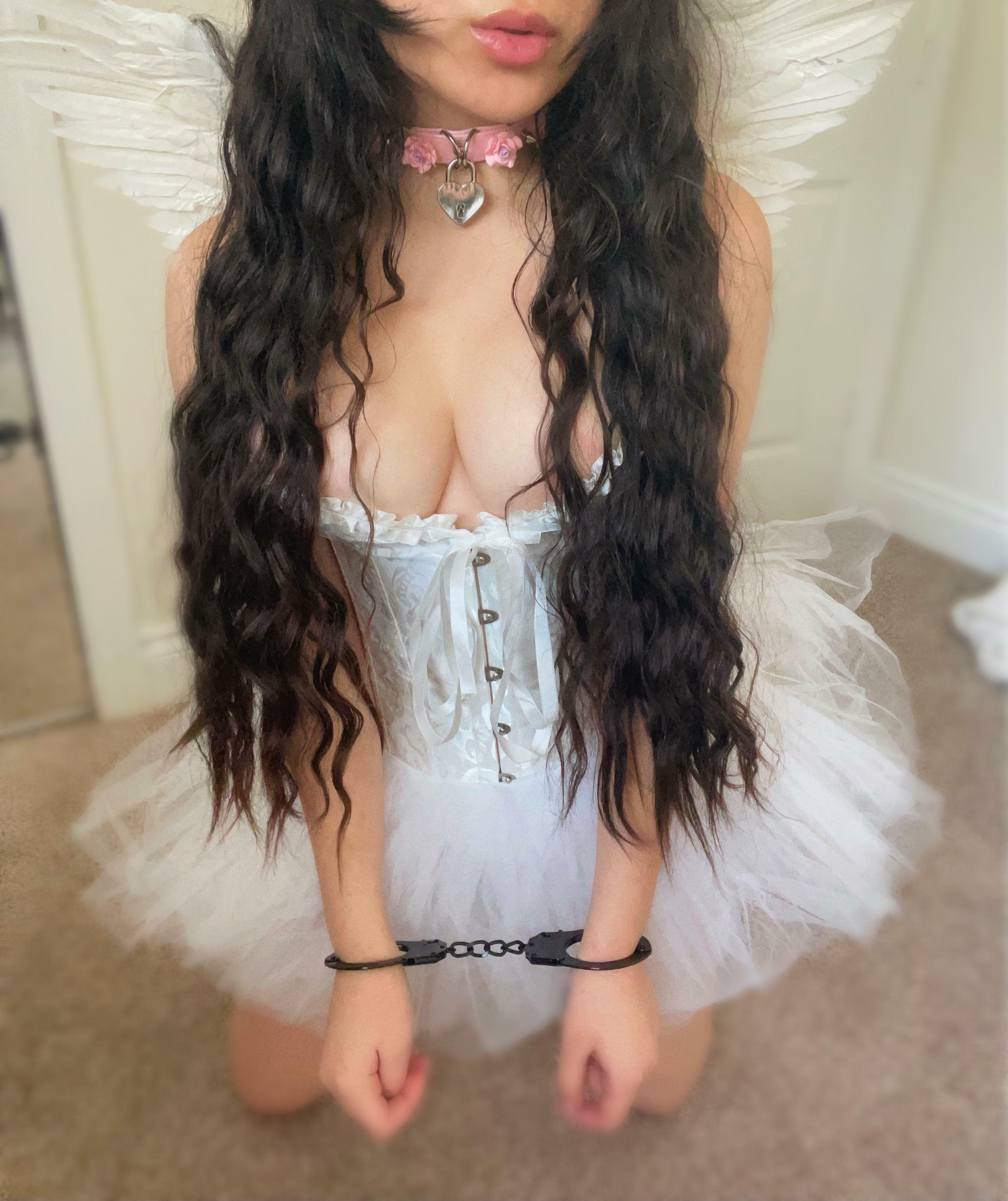 Cuffed and collared, being a good obedient angel ?