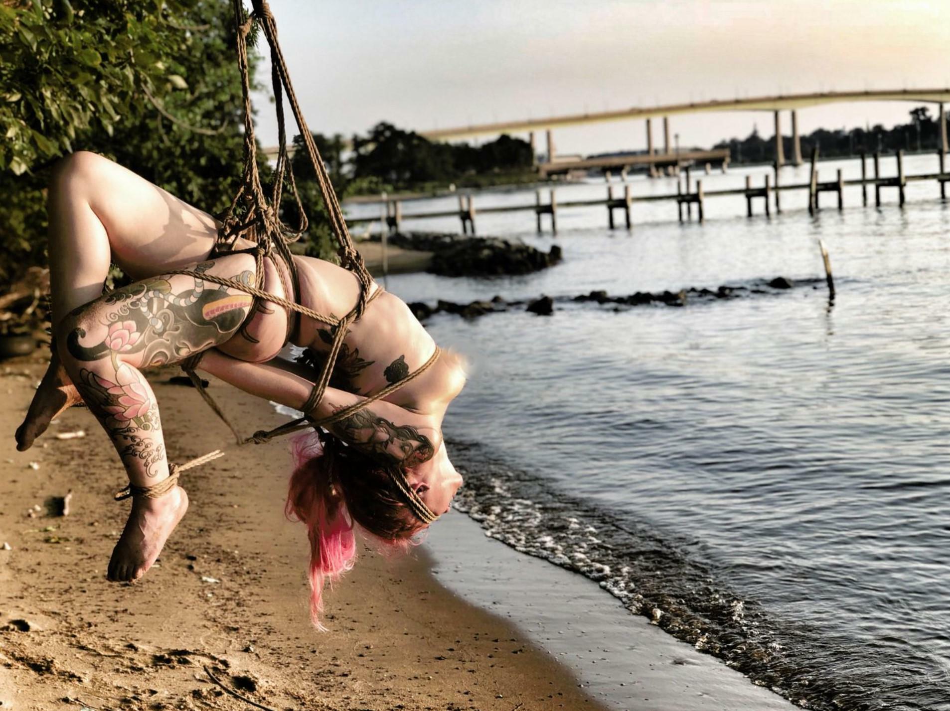 Sadly she can't even see how beautiful the view that she's tied by...