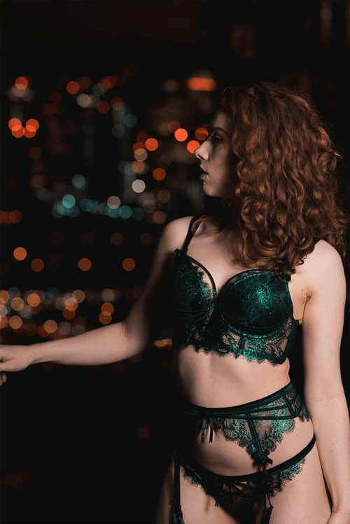 Emerald lingerie and the city lights