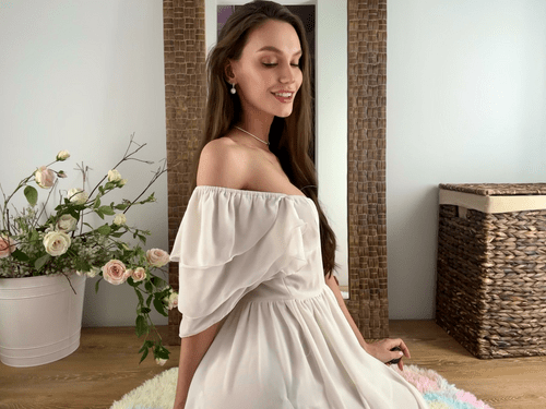 The girls in the dress look cute, but they're all dreaming of a big strong man.
