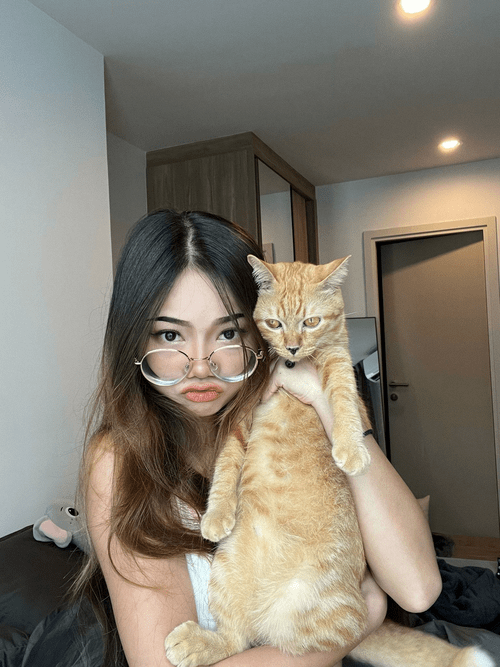 Cute girlfriend with cute cat