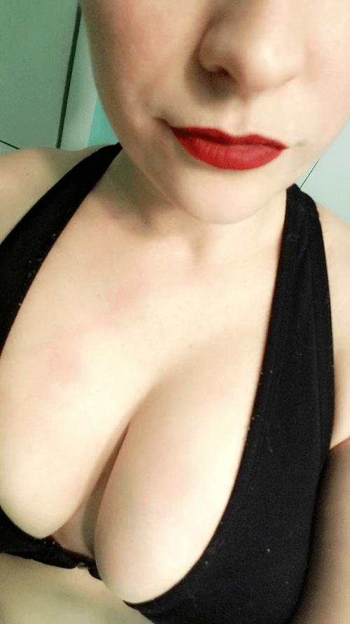 Little red lips and a whole lot of cleavage ;)