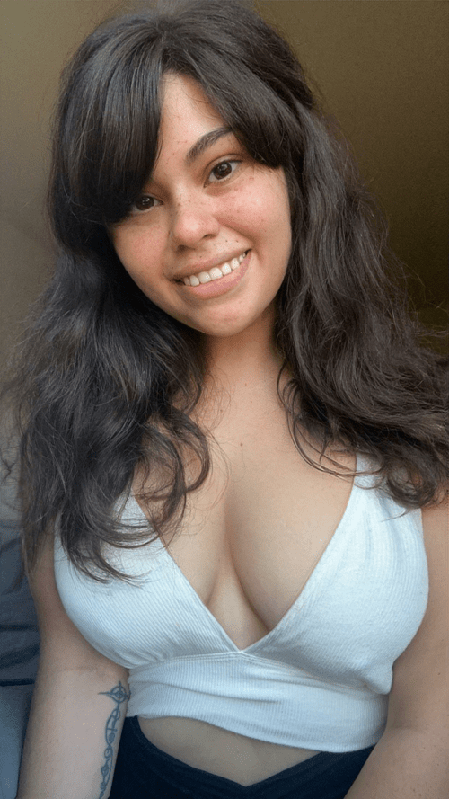 No makeup and some teasing cleavage