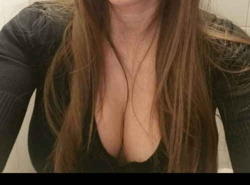 Wifes cleavage . Love this shirt on her