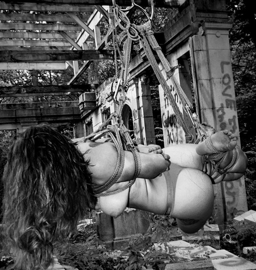 Rope bondage with an anaIng sub in the ruins of a building in Michigan.