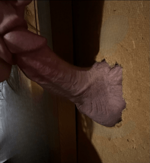 Blow job glory hole style!