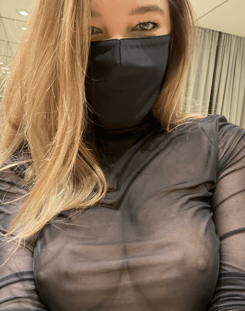 At the store, with a mask and no bra. ?